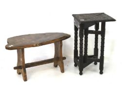 A small carved oak gate leg table and a natural wood coffee table.
