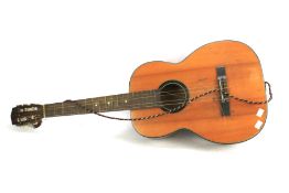 A classical acoustic guitar.