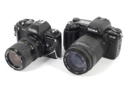 Two 35mm SLR cameras. To include a Vivitar V3800N with a 28-70mm 1:3.4-4.