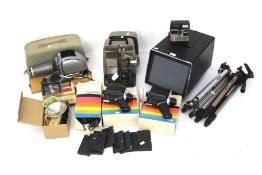 A quantity of assorted vintage photography items including Polaroid cameras, tripods,