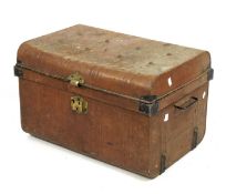 An early 20th century metal trunk.
