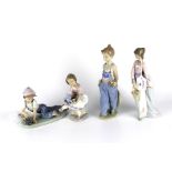 Four Lladro Collectors Society figures.