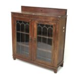A 20th century dark oak glazed two door, display cabinet. With two fixed shelves L92 x D29 x H99cm.