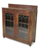 A 20th century dark oak glazed two door, display cabinet. With two fixed shelves L92 x D29 x H99cm.