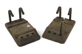 Two cast iron railway sleeper plates.