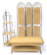 Four pieces of wicker furniture.