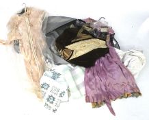 A quantity of vintage and Victorian women's clothing.