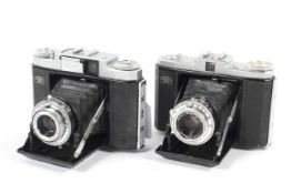 Two Zeiss Ikon 6x6 medium format folding cameras.