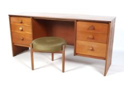 A mid-century Cantana Stag teak dressing table and a Danish stool.