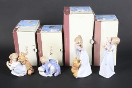 Four Nao Disney collection figures.