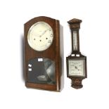 A vintage 1930s Kienzle pendulum wall clock and a 20th century barometer.