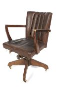 An early 20th century oak desk chair.