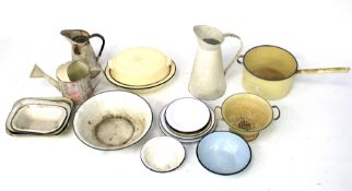 A quantity of assorted vintage kitchen enamel ware.