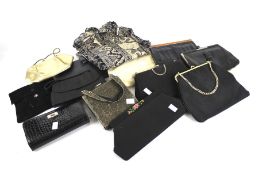 Twelve assorted vintage clutch handbags and a contemporary black purse.