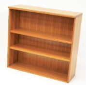 A contemporary wooden bookcase.