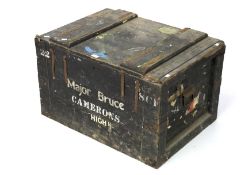 A vintage zinc lined wooden packing crate trunk.