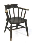 A 1930s/1940s smokers bow elbow chair.