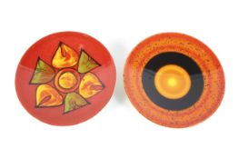 Two Poole pottery dishes including Pluto from The Planets series.