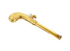A Victorian novelty gilt propelling pencil in the form of a flintlock pistol.