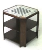 A 1930s glass topped coffee table. With later knitwear chess board.