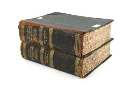 Volumes 1 & 2 of 'New Standard Dictionary of The English Language'.