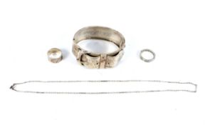 An assortment of white metal and silver costume jewellery.