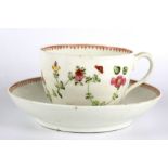 A 19th century porcelain hand painted teacup and saucer.