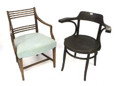 Two elbow chairs.