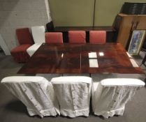 An Italian polished and black lacquered flame mahogany veneered dining suite.