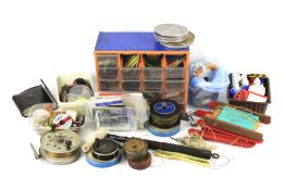 A box of assorted course fishing tackle, reels and accessories. Plus crab lines, etc.