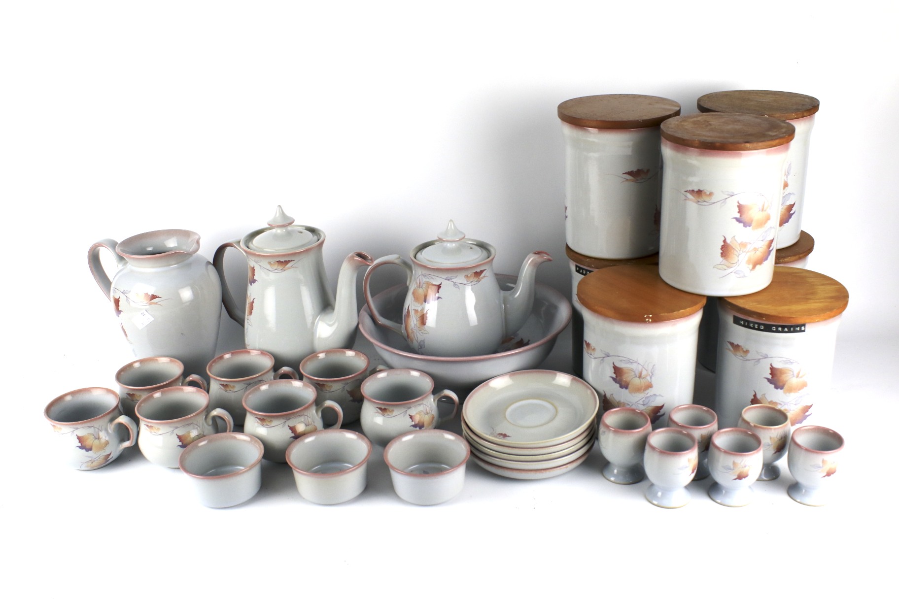 A Denby part tea and kitchen service in the 'Twilight' pattern.