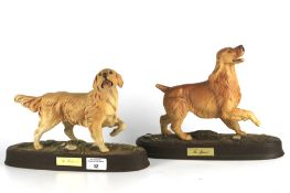 Two Beswick dog figures.