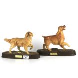 Two Beswick dog figures.