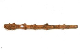A large wooden shillelagh.