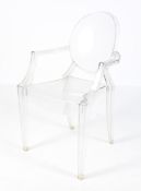 A Louis Ghost chair designed by Philippe Starck (b.1949) for Kartell.