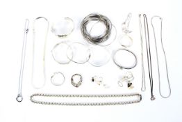 An assortment of silver, white metal and costume jewellery.
