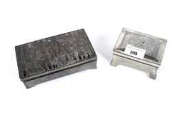 Two pewter boxes.