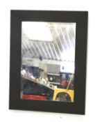 A contemporary leather framed wall mirror. Of rectangular form, 50cm x 70cm.
