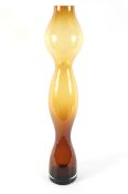 A 1960s/1970s large amber tinted bubble-shaped glass vase or lamp base.