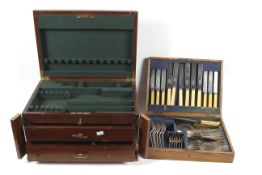 An oak canteen of cutlery and a mid-20th century canteen.