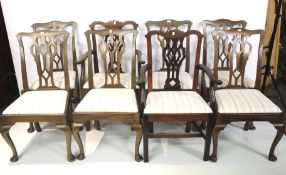 A set of six dining and two carver chairs.