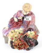 A Royal Doulton figurine group. 'The Flower Seller's Children' HN1342, no 344 H25.