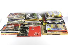 An assortment of 21st century Leeds United football programmes and collectables.