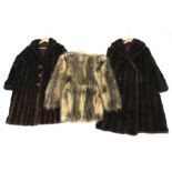 Three vintage fur coats.
