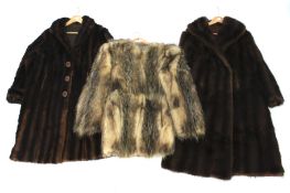 Three vintage fur coats.