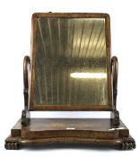 A 20th century walnut veneered dressing table swing mirror.