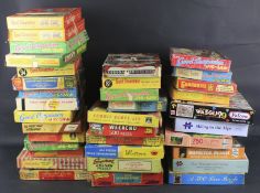 A collection of assorted jigsaw puzzles.