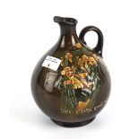 A Royal Doulton jug titled 'He's a jolly good fellow '.