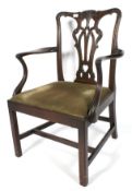 A Victorian mahogany open elbow chair.