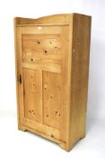 A contemporary pine cupboard. With single door and three fixed shelves inside. L81 x D39 x H145cm.